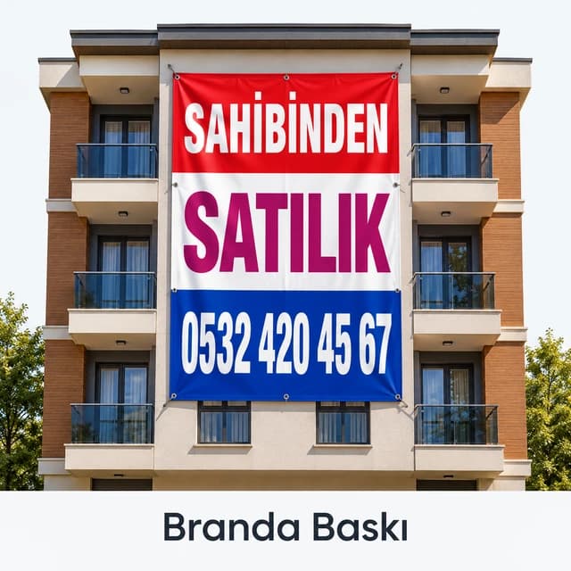 Eskişehir'de apartman cephesine asılan sahibinden satılık daire brandası