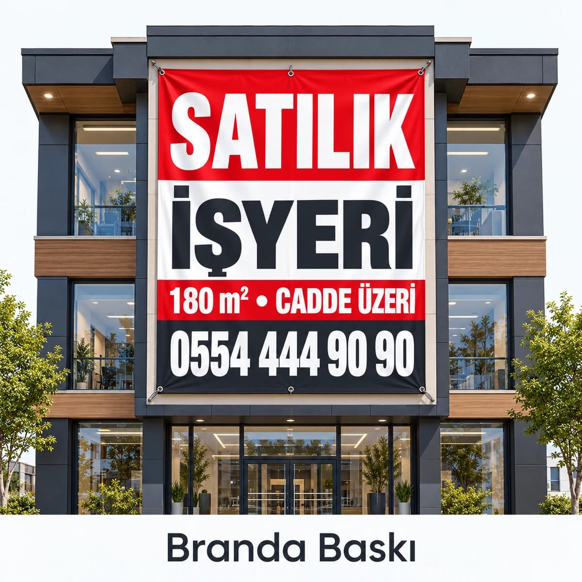 Eskişehir'de işyeri cephesine asılan kırmızı siyah satılık işyeri brandası