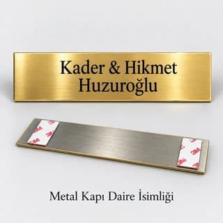 Eskişehir'de aile adı yazılı altın sarısı daire kapı isimliği