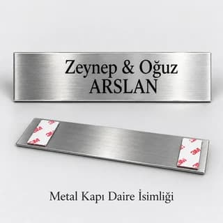 Eskişehir'de aile adı yazılı gümüş rengi daire kapı isimliği