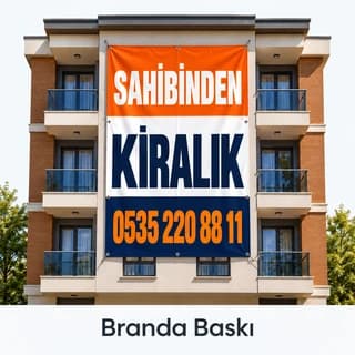 Eskişehir'de apartman cephesine asılan sahibinden kiralık daire brandası