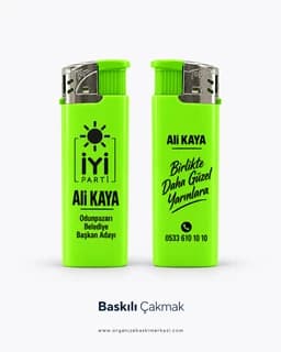 Eskişehir'de seçim çalışması için isim ve slogan baskılı yeşil çakmak